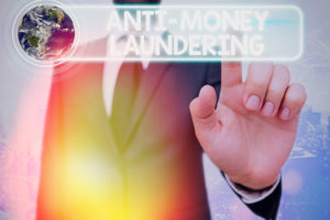 Writing note showing Anti Money Laundering. Business photo showcasing regulations stop generating income through illegal actions Elements of this image furnished by NASA.
